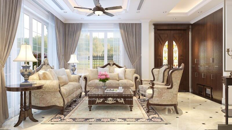 Phòng khách được nâng tầm sang phong cách quý phái hơn với sự xuất hiện của mẫu Sofa Tân cổ điển cao cấp, được làm từ gỗ tự nhiên và bọc bằng nỉ hoa văn.